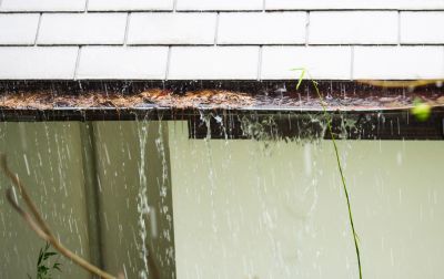 Water Overflowing from Clogged Gutters